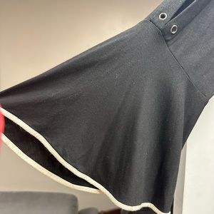 Cable & Gauge long sleeve top with beige trim, open arms and wide sleeves